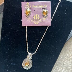 Premier Designs Silver and Gold Earrings